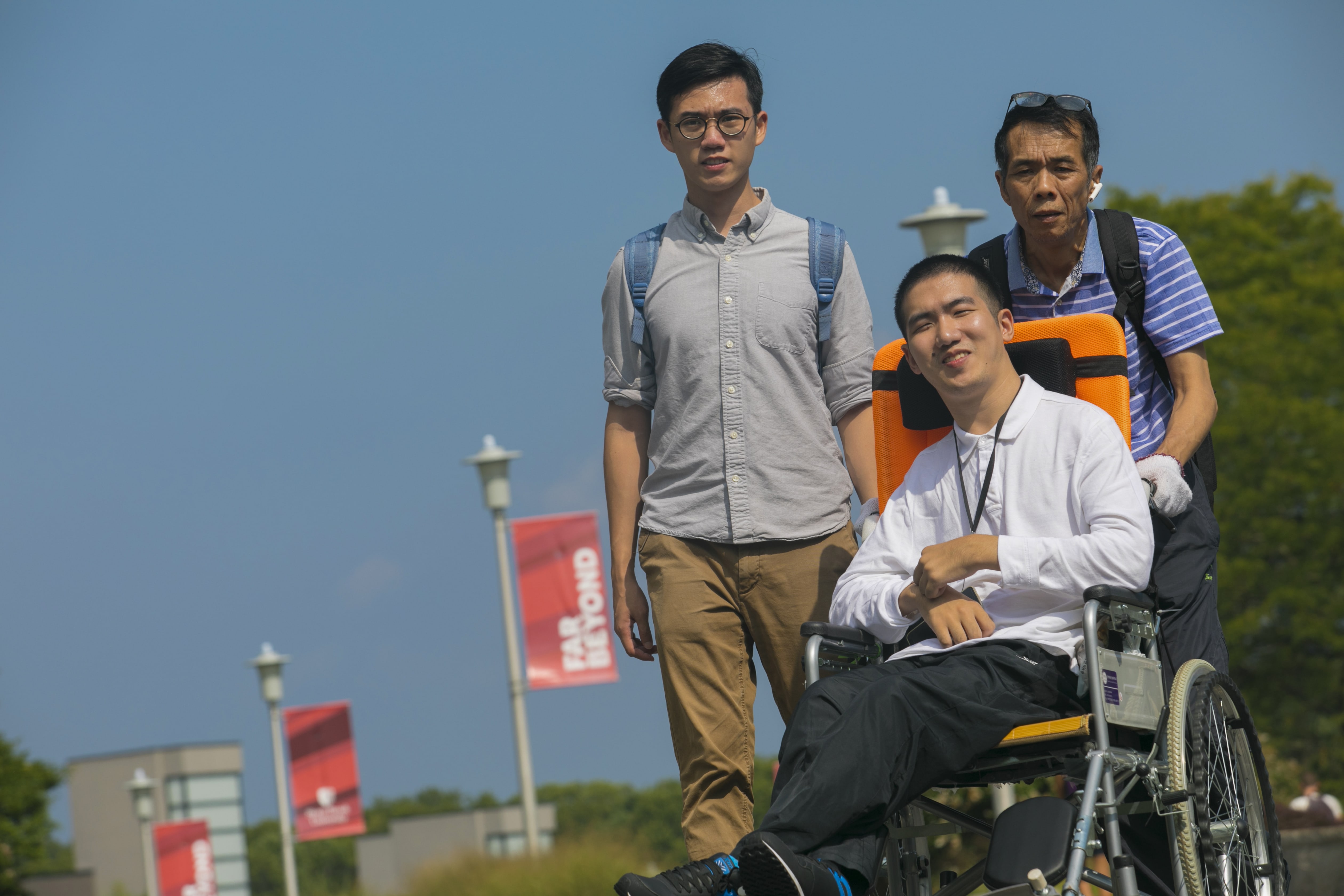 Maverick Mo with father Xiaohong Mo and fellow student Hanyu Zhang.