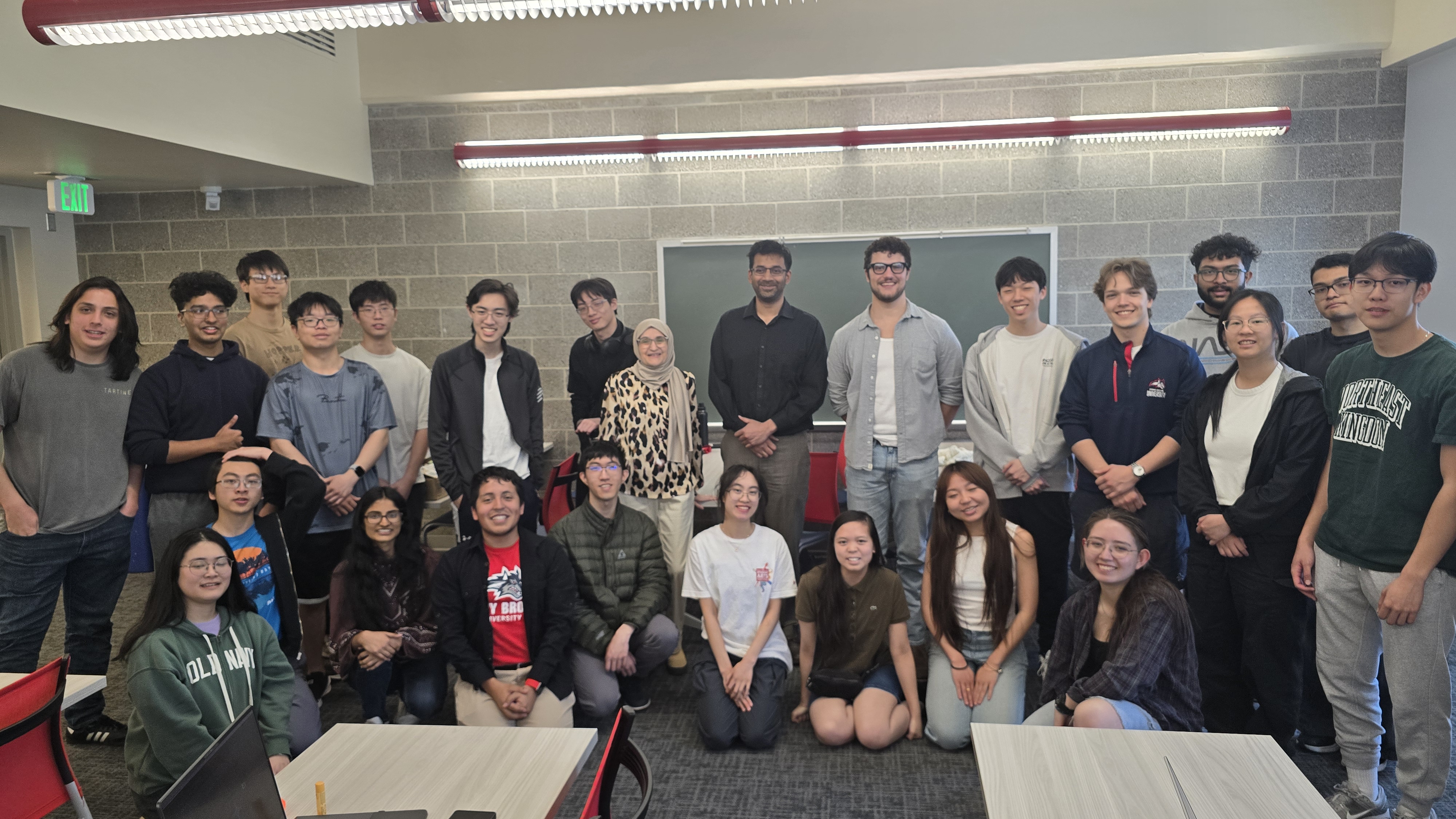 a large group of students pose for a group photo