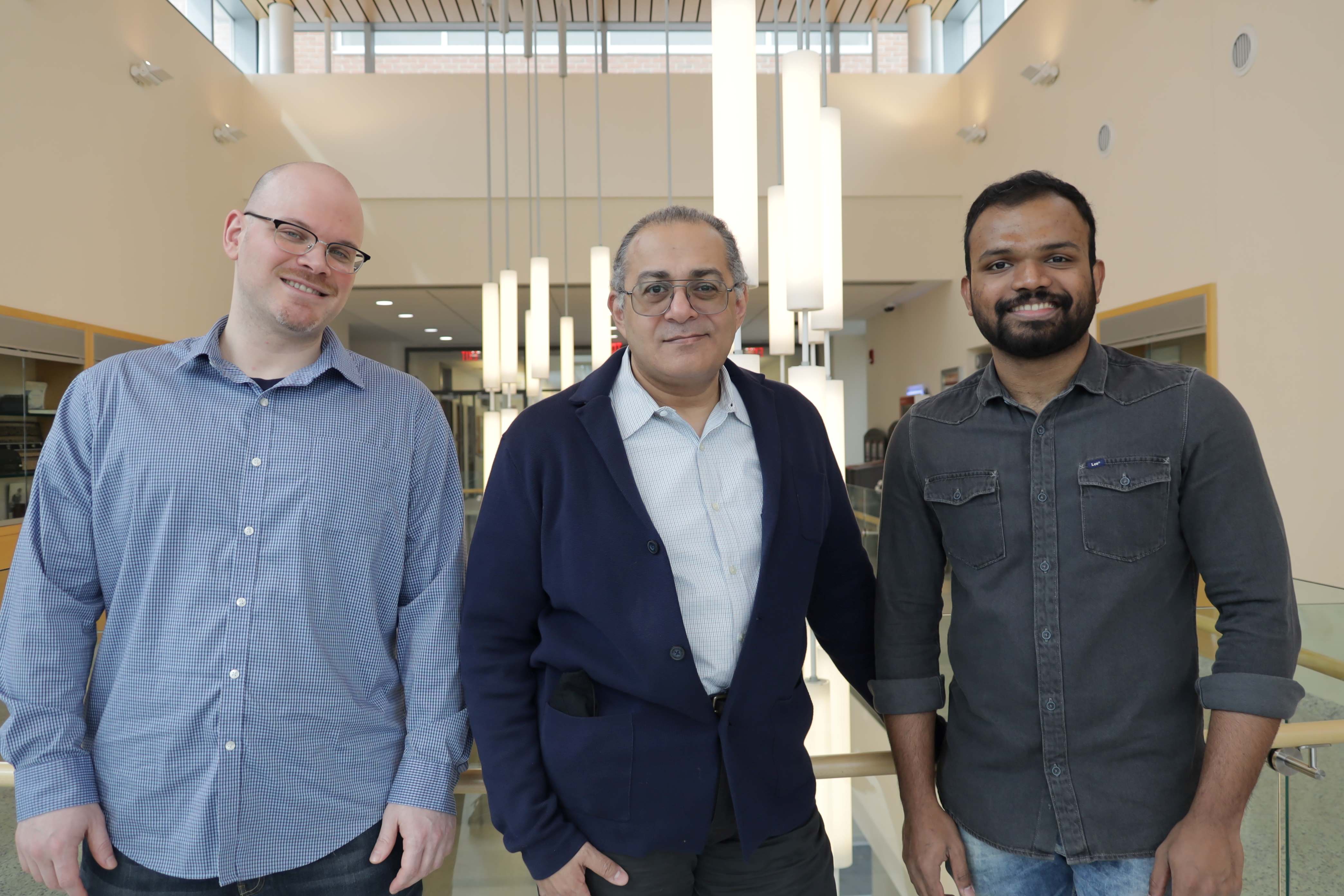  Pictured: L-R Tyler Estro (PhD candidate), Erez Zadok (CS professor), Kamalnath Polakam (MS student)