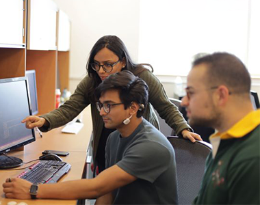 Prof. Shubham Jain working with PhD students in her research lab