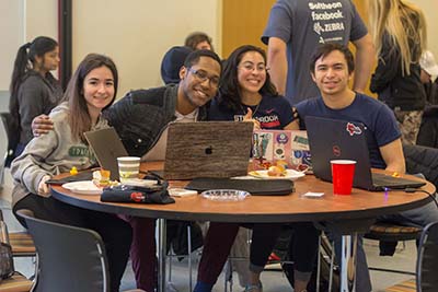 Pictured: Computer science students at a hackathon