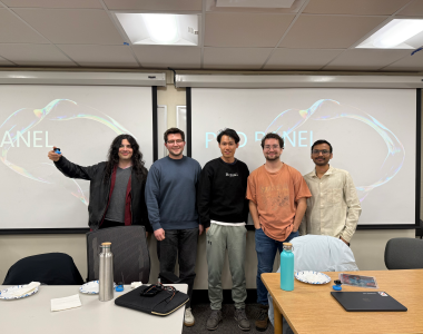 PhD panelists pose for a photo after the event. 