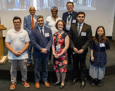 event participants pose in group photo